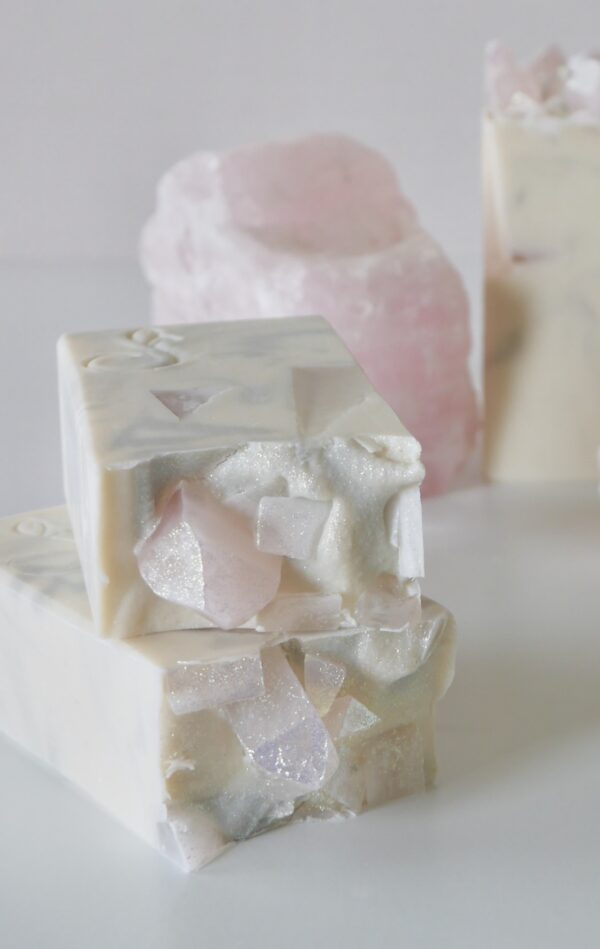 white soaps with soap rose quartz crystals stacked