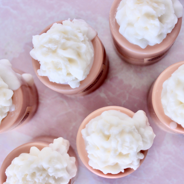 Six Butter beer wax melts displayed showing an arierl view of the wax froth on top of the base.