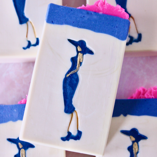White soap with stamp of lady wearing blue hat and pumps