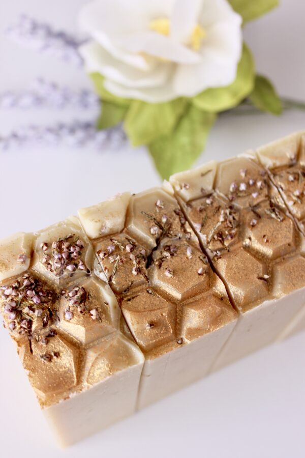 soap with honey comb top and dried heather flowers on top